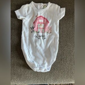 “Lucy” onesie